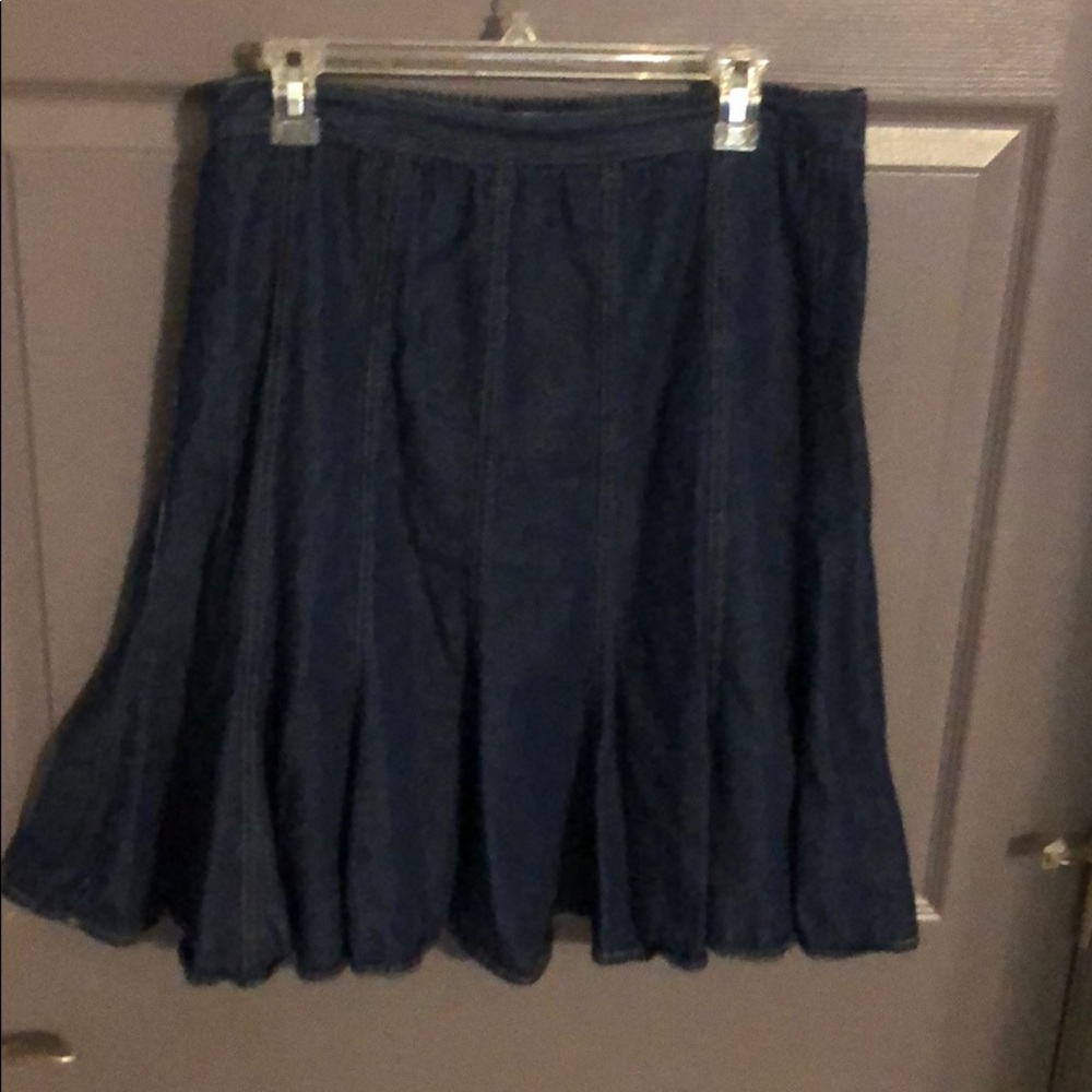 Below the knee denim skirt.